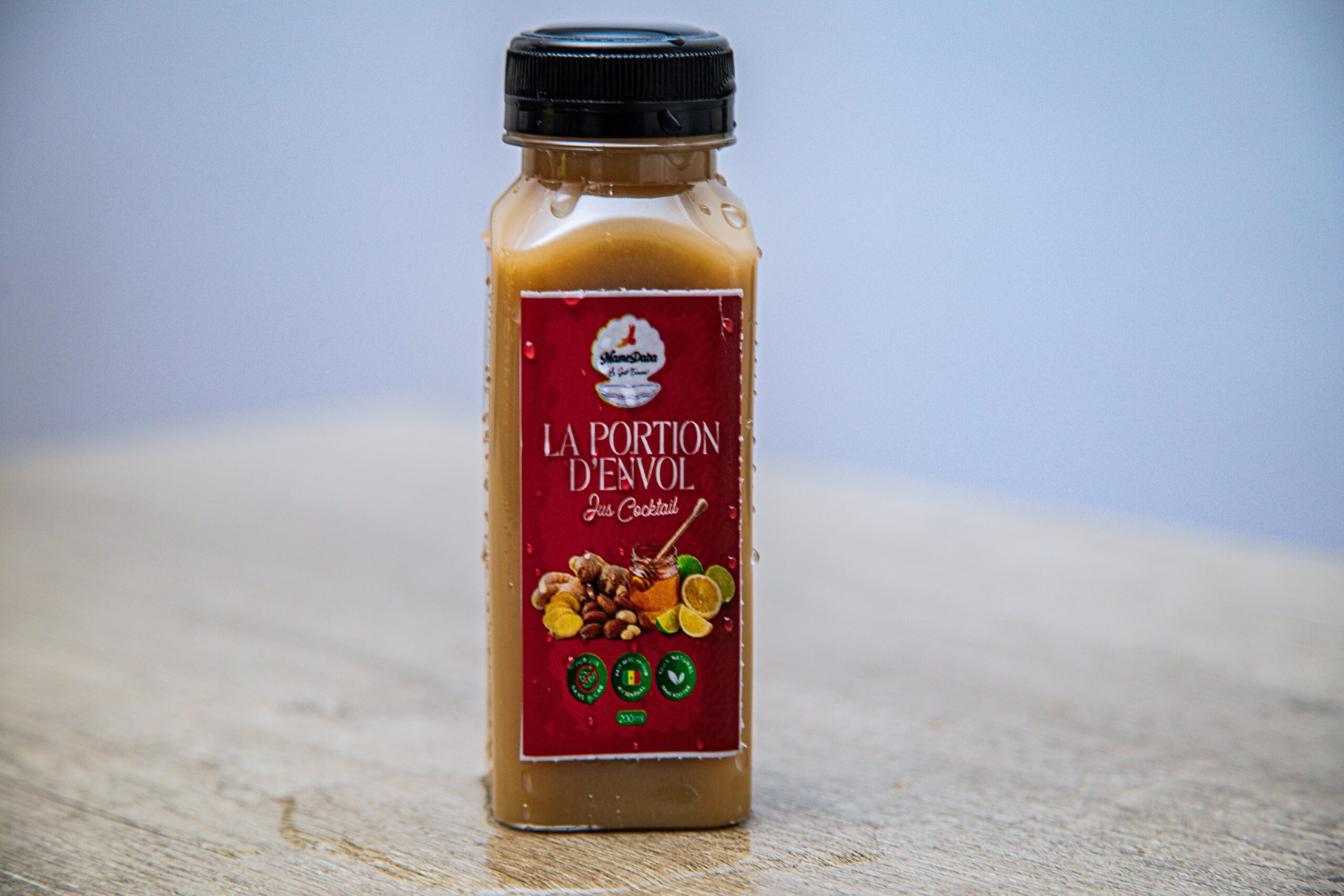 Jus envol à base de gingembre - Petit Cola - Miel - Citron